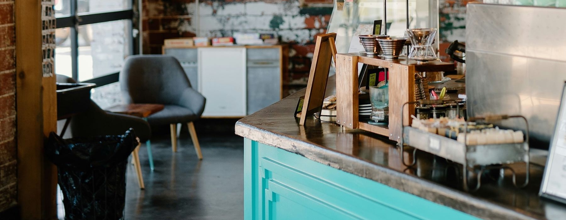 a coffee shop with a front counter