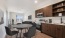 a kitchen with a dining table and chairs