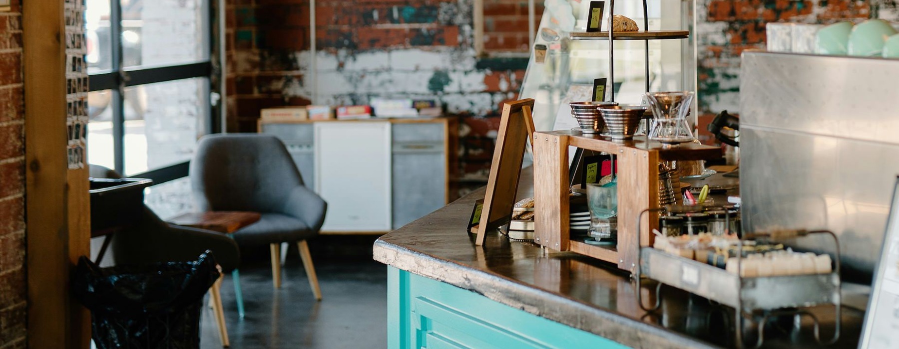 a shop with a counter and seating