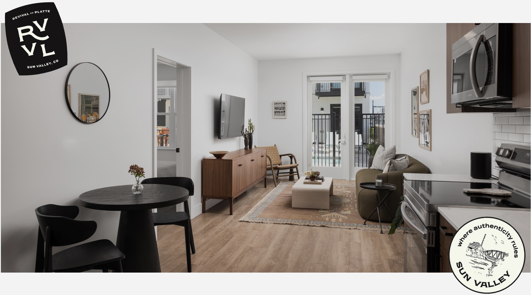 living room with a large window and open spaces