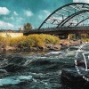 river with arched bridge